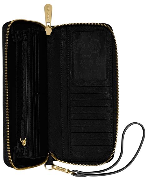 michael kors travel continental black wallet|Michael Kors monogram zip wallet.